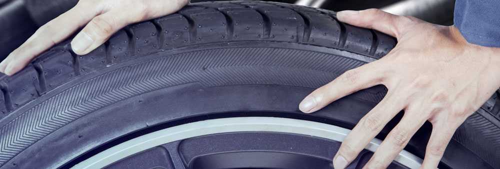 A Technician Fitting New Tyres Bingham's Pitstop Autocentre